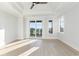 Bright bedroom has large windows offering a scenic view of the surrounding neighborhood at 105 Serenity Point Dr., Little River, SC 29566