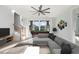 Entertainment room featuring a pool table, large windows, and a comfortable seating area for relaxation at 105 Serenity Point Dr., Little River, SC 29566