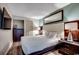 Comfortable bedroom featuring a plush bed, stylish lighting, and modern decor elements at 107 S Ocean Blvd. # 1407, Myrtle Beach, SC 29577