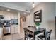 Cozy dining area adjacent to the kitchen, featuring modern decor and a charming ambiance at 107 S Ocean Blvd. # 1407, Myrtle Beach, SC 29577