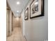 Bright hallway with tile floors, recessed lighting and neutral walls, leading to various rooms at 107 S Ocean Blvd. # 1407, Myrtle Beach, SC 29577