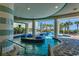 Relaxing lazy river with blue inflatable rings and palm trees in the background, perfect for a resort-style vacation at 107 S Ocean Blvd. # 1407, Myrtle Beach, SC 29577
