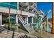 Water playground with soft splash areas, a shipwreck climb, and water cannons, perfect for ' entertainment at 107 S Ocean Blvd. # 1407, Myrtle Beach, SC 29577