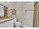 A cozy bathroom featuring granite countertops, a shower with a curtain, and tile floors at 1109 Bonnet Dr., North Myrtle Beach, SC 29582
