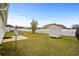 Spacious fenced backyard with a small storage shed and mature tree offering shade at 1113 Green Fir Loop, Conway, SC 29527