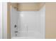 An all white tub and tiled shower with a shower head at 1113 Green Fir Loop, Conway, SC 29527
