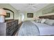 Spacious main bedroom features with soft lighting and a large dresser at 121 Osprey Watch Circle # 9-C, Pawleys Island, SC 29585