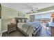Spacious main bedroom features a balcony with scenic views and hardwood flooring at 121 Osprey Watch Circle # 9-C, Pawleys Island, SC 29585