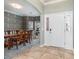 Formal dining room featuring elegant wallpaper and a classic wooden dining set at 1268 Brighton Ave., Myrtle Beach, SC 29588
