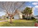 Inviting single-Gathering home featuring manicured lawn and attached two-car garage at 1268 Brighton Ave., Myrtle Beach, SC 29588