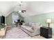 Finished attic space converted into a living room with comfortable sofa and desk at 1268 Brighton Ave., Myrtle Beach, SC 29588