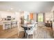 Spacious open-concept layout connecting the kitchen, dining area, and living room for easy living at 1384 Palm Springs Paloma Dr, Longs, SC 29568