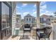 Charming balcony with comfortable seating, offering a serene outdoor space and views of the neighborhood at 1423 Peterson St., Myrtle Beach, SC 29577