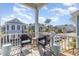 Charming balcony with comfortable seating, offering a serene outdoor space and views of the neighborhood at 1423 Peterson St., Myrtle Beach, SC 29577