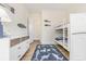 Bright bedroom features a white bunk bed, wood-look flooring, and nautical themed decor at 1423 Peterson St., Myrtle Beach, SC 29577