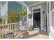 Inviting front porch with coastal decor, comfortable seating, and a welcoming entrance at 1423 Peterson St., Myrtle Beach, SC 29577