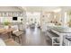 Bright open-plan living area with hardwood floors, a casual dining area, and a living space featuring a modern aesthetic at 1423 Peterson St., Myrtle Beach, SC 29577
