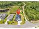 An aerial view of the property showcases its prime location near lush forestry at 144 Sago Palm Dr., Myrtle Beach, SC 29579