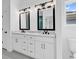 The bathroom boasts dual sinks, granite counters, modern fixtures, and a private toilet area at 144 Sago Palm Dr., Myrtle Beach, SC 29579
