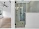 Bathroom features modern fixtures, a large walk-in shower with glass door and tile surround at 144 Sago Palm Dr., Myrtle Beach, SC 29579
