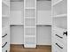 A walk-in closet features rods, shelving and built-in drawers providing ample storage space at 144 Sago Palm Dr., Myrtle Beach, SC 29579
