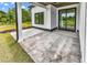 Covered patio area with outdoor living space perfect for entertaining and relaxing at 144 Sago Palm Dr., Myrtle Beach, SC 29579