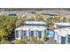 Stunning aerial view of condo community with a pool, picturesque lake, and beautiful neighborhood at 1500 Cenith Dr. # E302, North Myrtle Beach, SC 29582