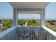Charming balcony with scenic ocean view, perfect for relaxation and outdoor enjoyment at 164 Vineyard Place # 23, Pawleys Island, SC 29585