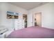 Bright bedroom featuring a television and access to the bathroom at 164 Vineyard Place # 23, Pawleys Island, SC 29585