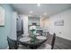 Cozy dining area adjacent to the kitchen, perfect for enjoying meals with Gathering and friends at 164 Vineyard Place # 23, Pawleys Island, SC 29585