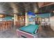 Entertaining game room with a pool table, bar, and comfortable seating for leisure and socializing at 205 74Th Ave. N # 904, Myrtle Beach, SC 29572
