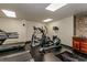 Well-equipped gym featuring treadmills, ellipticals, and sleek black flooring for fitness enthusiasts at 205 74Th Ave. N # 904, Myrtle Beach, SC 29572