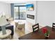 Living room with fireplace, flatscreen and ocean view balcony at 205 74Th Ave. N # 904, Myrtle Beach, SC 29572