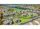 Aerial view of the complex, showcasing the buildings, parking, and nearby waterway in relation to the community at 213 Landing Rd. # F, North Myrtle Beach, SC 29582