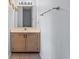 This bathroom boasts a single sink vanity and neutral decor at 213 Landing Rd. # F, North Myrtle Beach, SC 29582