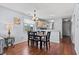 Open-concept dining room area with a six-chair dining set and a view of the kitchen at 213 Landing Rd. # F, North Myrtle Beach, SC 29582