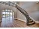 Spacious foyer features a grand staircase, hardwood floors, and high ceilings with lots of natural light at 2417 Gist Ln., Myrtle Beach, SC 29588