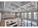 Open-concept great room with high ceilings, large windows, and views of the waterfront at 2417 Gist Ln., Myrtle Beach, SC 29588
