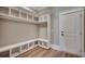 Convenient mudroom with built-in bench, storage cubbies, and a door for easy access at 2417 Gist Ln., Myrtle Beach, SC 29588