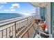Relaxing balcony with ocean views, outdoor seating, and sunny skies at 2501 South Ocean Blvd. # 1011, Myrtle Beach, SC 29577