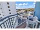 Relax on this balcony with ample seating that overlooks parking and community area at 2501 South Ocean Blvd. # 1011, Myrtle Beach, SC 29577