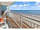 Relaxing balcony with ocean views and comfortable outdoor seating under sunny skies at 2501 South Ocean Blvd. # 1011, Myrtle Beach, SC 29577