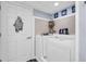 Walk-in bathtub surrounded by tiled walls and modern lighting fixtures at 2501 South Ocean Blvd. # 1011, Myrtle Beach, SC 29577