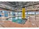 Inviting indoor pool area with bright blue accents and lounge seating at 2501 South Ocean Blvd. # 1011, Myrtle Beach, SC 29577