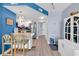 Bright kitchen with white cabinets, stainless steel appliances, and a view into the living space at 2501 South Ocean Blvd. # 1011, Myrtle Beach, SC 29577