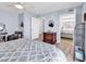 Bright bedroom features ensuite access, a vanity, and wood-look floors at 2501 South Ocean Blvd. # 1011, Myrtle Beach, SC 29577