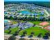 Sprawling aerial view of a well-planned community with homes, ponds, and recreational areas at 256 Copper Leaf Dr., Myrtle Beach, SC 29588