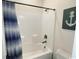 Bathroom with shower/tub combination and blue striped curtain at 256 Copper Leaf Dr., Myrtle Beach, SC 29588