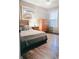 Bright bedroom features hardwood floors and a large painting at 256 Copper Leaf Dr., Myrtle Beach, SC 29588