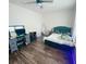 Bedroom with hardwood floors, a ceiling fan, and ample lighting at 256 Copper Leaf Dr., Myrtle Beach, SC 29588